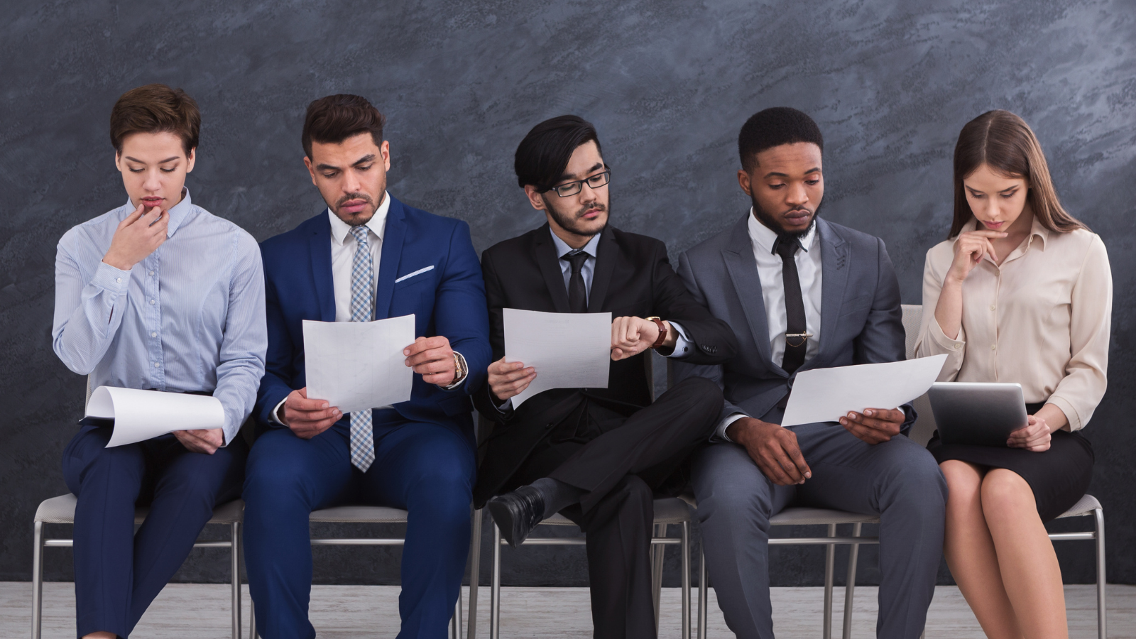 Monarch article on accounting and finance hiring trends 2026. Image of 5 professionals waiting to be interviewed for a job