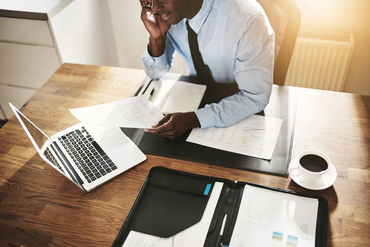 Businessman reviewing his resume
